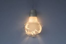 Swedish studio Gässling achieved the look of shattered glass by 3D printing the diffuser of its Wreaking Ball lamp.