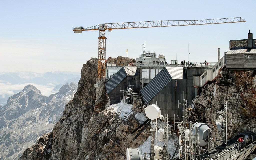 A crane is installed on the Zugspitze, Germany's highest mountain, to build the new cable car set to replace the current Eibsee cable car in December 2017.