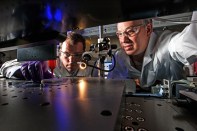 Using an additive manufacturing process called direct ink writing, Lawrence Livermore National Laboratory (LLNL) engineers Eric Duoss (left) and Tom Wilson create an engineered-foam cushion.