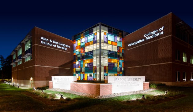 Night+shot+of+campus+from+the+school%27s+primary+public+face.