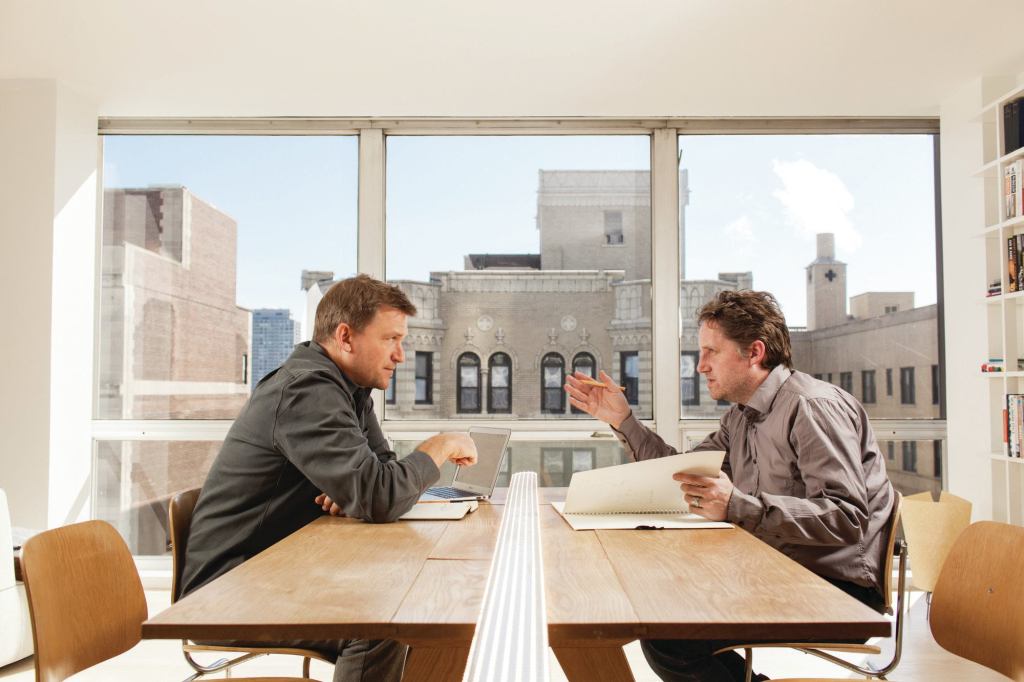Duncan Jackson (left) and Eoin Billings (right) at work in the firm’s Chicago office.