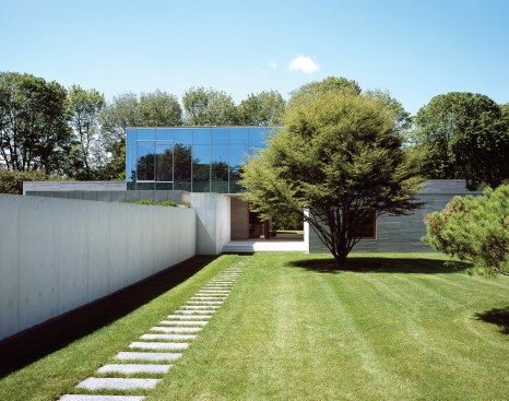 View of house and entry path from northeast.