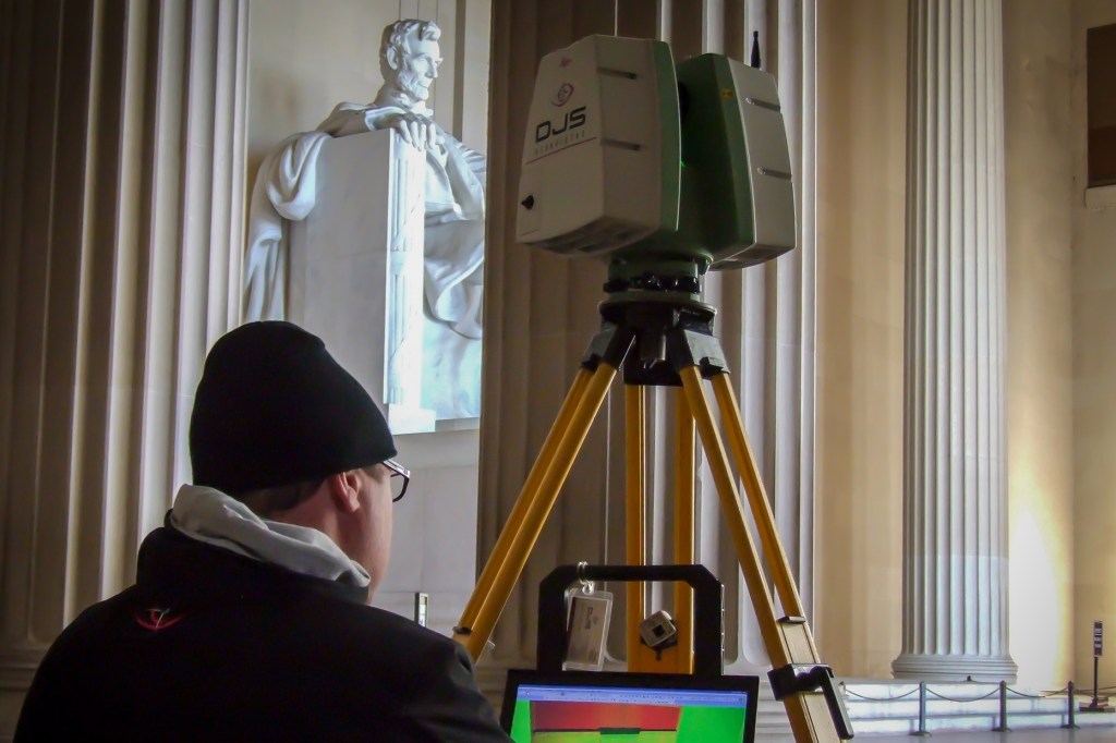 A worker laser scans the Lincoln Memorial. The data will be included in a digital database of world heritage sites run by the nonprofit CyArk.