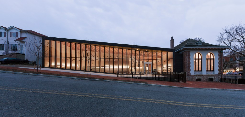 The new 12,000-square-foot addition to the Stapleton Library on Staten Island is a luminous rectangular box that flows easily from the existing structure.