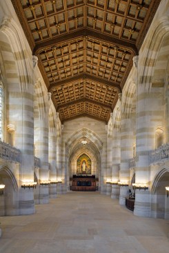 A view of the nave looking toward the mural Alma Mater.