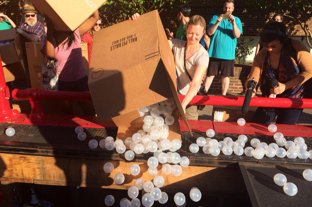 Volunteers poured the first batch of "The Beach" balls into the Dupont Underground space in September 2015.