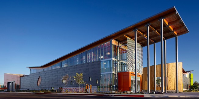 The Amazeum's lobby roof transitions from a stacked structural system of girders and beams inside to a composite structure in the entrance canopy, where the structural members are in one plane.
