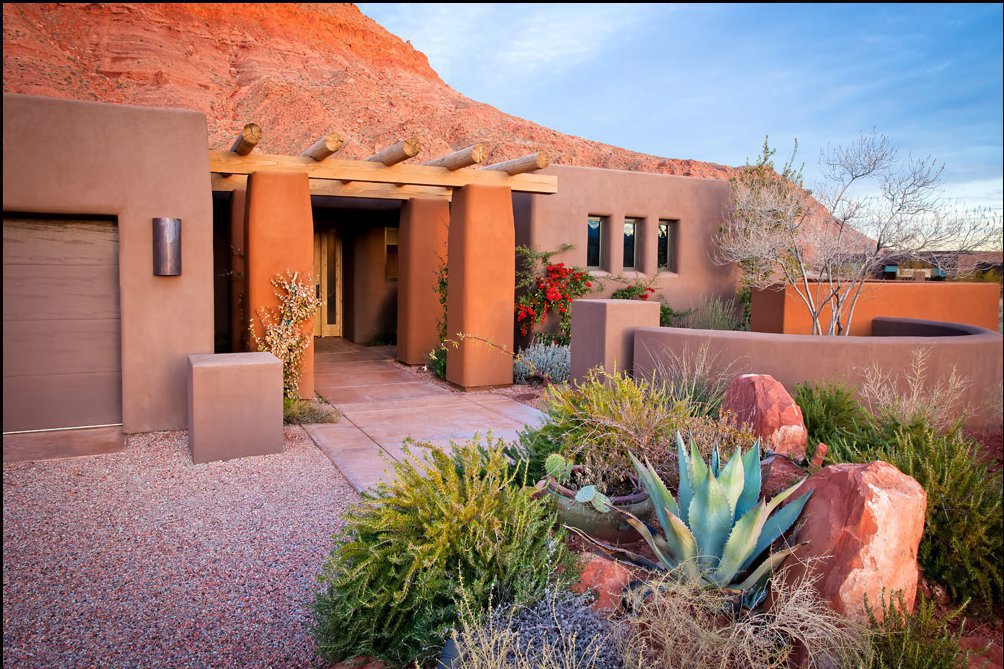Utah-based J2 Builders revegetates its building sites with plants such as yucca, cactus, agave, and sand sage, low-maintenance natives that help the house meet the ground gracefully.
