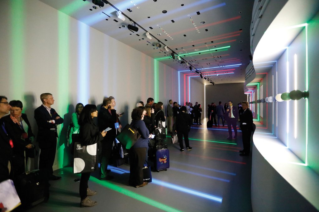 Massimiliano Guzzini (with microphone) welcomes visitors to the Light Experience during Light+Building 2016.