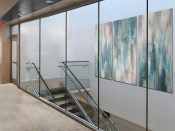Stairwells can now achieve transparency from fire resistive, oversized butt-glazed assemblies.