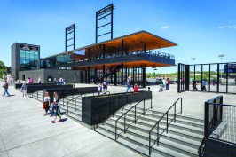 Fourth Street entrance with sunken seating and field below.