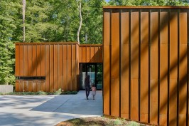 Corten® steel provides a modest, low-maintenance exterior (it will never need painting) that will eventually weather to blend into the natural setting.