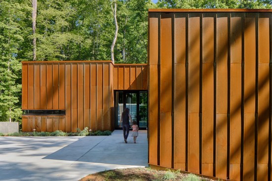 Corten® steel provides a modest, low-maintenance exterior (it will never need painting) that will eventually weather to blend into the natural setting.