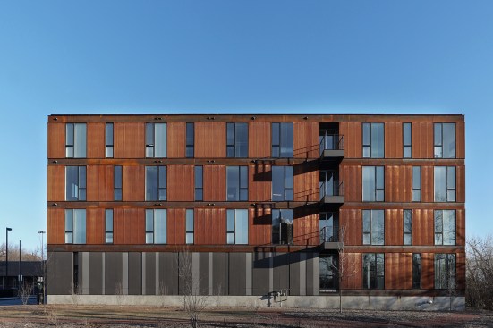 The south façade incorporates three shared balconies. 