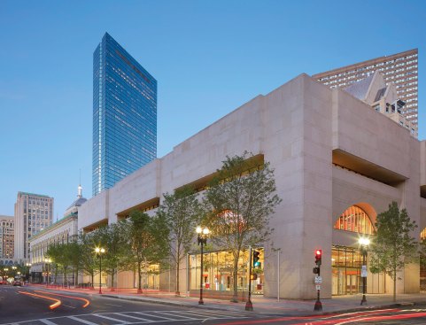 The distinct architectural styles of the library's two buildings’ façades on Boylston Street.