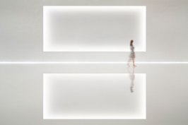 A recessed screen surface is softly framed by a carefully detailed knife-edge cove, hiding the light source from view even at the shallowest viewing angles.
