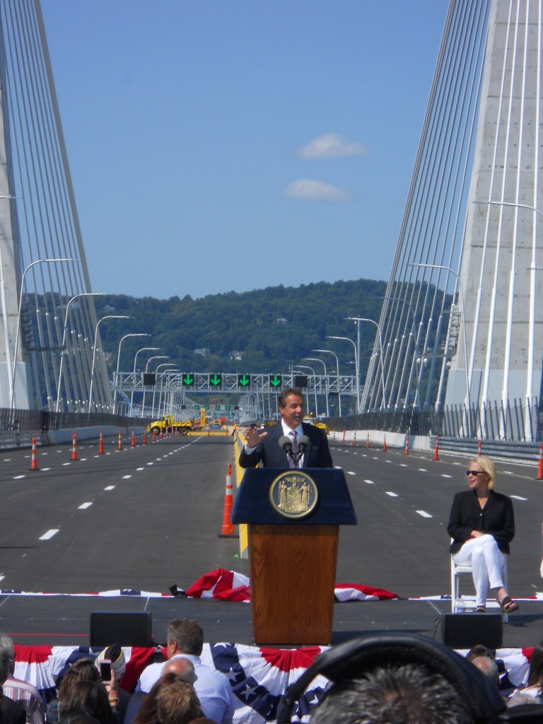 New York Governor Andrew Cuomo addressing crowd at ribbon-cutting ceremony for bridge named after his father, former governor Mario Cuomo.