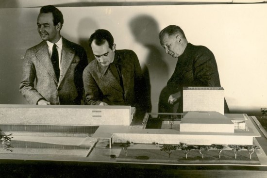 Ben Baldwin, Harry Bertoia, and Eliel Saarinen scrutinize a never-built model c. 1939 for the Smithsonian Gallery of Art.
