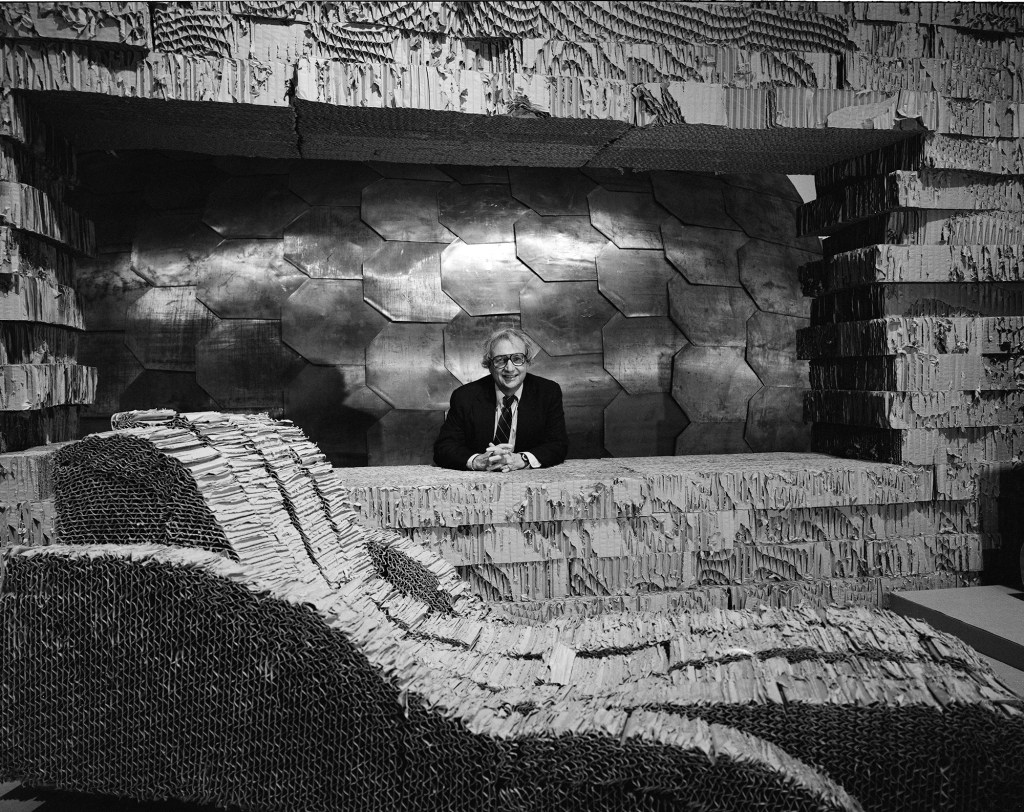 Frank Gehry with his lead-scaled fish sculpture at the Walker Art Center in Minneapolis.