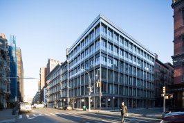The building design reflects the 19th century cast iron architecture of the SoHo district.