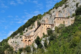At the age of 14, Benedict of Nursia left his studies in 5th century Rome to live alone for three years in a cave near the present-day town of Subiaco. In the 12th century, monks began to erect a monastery on the cliffside site.