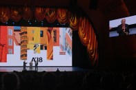 AIA executive vice president and CEO Robert Ivy and 2018 AIA president Carl Elefante present the 2018 AIA Gold Medal to James Polshek.