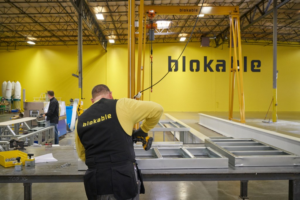A worker in Blokable's Vancouver, Wash.-based manufacturing site