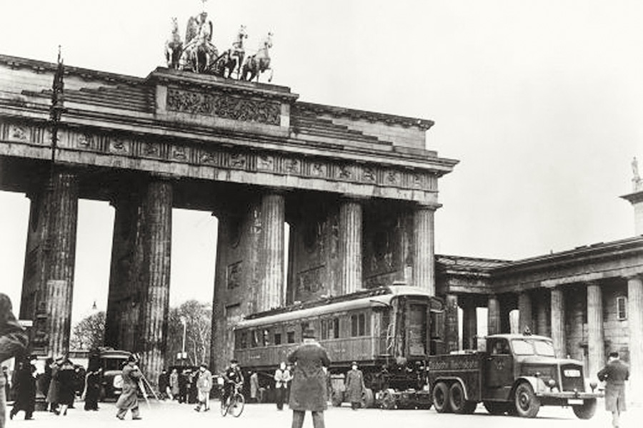 French marshal Ferdinand Foch’s rail car, in which two armistices were signed, passes through the Brandenburg Gate into Berlin, c. 1940.