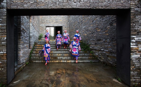 Miao minority girls at the entrance of the cultural center