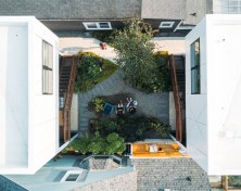 Residents can relax in the landscaped courtyard between the two duplexes.