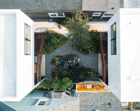 Residents can relax in the landscaped courtyard between the two duplexes.