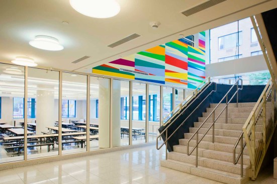 View of lobby with main stair and cafeteria