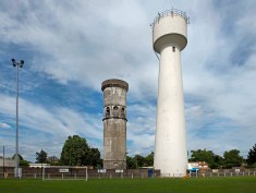 Le Corbusier's water tower in Podensac, France (the lower structure, at center), was built during World War I, at the beginning of his career.