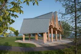 A steeply sloped, RHEINZINK-clad roof is the architectural focal point of an open-air pavilion at the new Trillium Park and William G. Davis Trail at Ontario Place in Toronto.