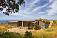 Dani Ridge in Big Sur, Calif., designed by Studio Schicketanz with mechanical engineering design from Monterey Energy Group, combines passive solar design with a propane boiler used for radiant heating.