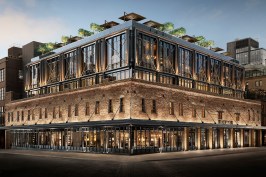 The new construction enhances RH New York's historic facade. Two disparate elements are made harmonious with the use of warm color temperature lighting both inside and out.