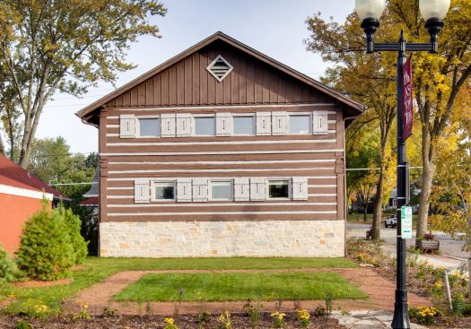 The building is set back from North Avenue to create a small park-like space