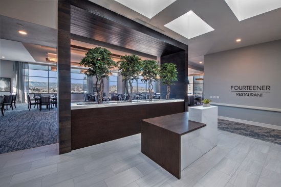 On the top floor, Atria Englewood residents are afforded an unobstructed panoramic view of the Colorado Rocky Mountains from the formal dining room.