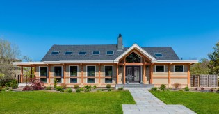 Cape Cod-style home renovated for use as a  rehearsal space.