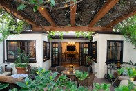 Nestled in the Hollywood Hills, this Rancho-style home first built in 1925 received an outdoor living upgrade using Redwood timbers.