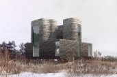 Living areas in the 1,280-square-foot Plum Island House in Newburyport, Mass., are defined by three curvilinear volumes clad in cedar shingles.