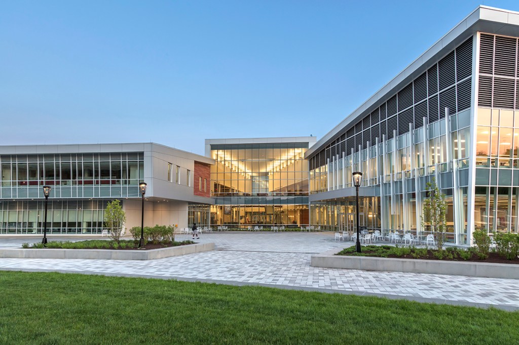 Ashbery lights bridge the design between the new Student Success Center with its modern glass architecture and the traditional brick buildings on campus.