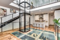 Future-proofing for aging-in-place doesn’t have to sacrifice space or style. Savaria Vuelift panoramic residential elevators (Octagonal model pictured) add wow-factor to a home’s design while allowing residents to skip the stairs.
