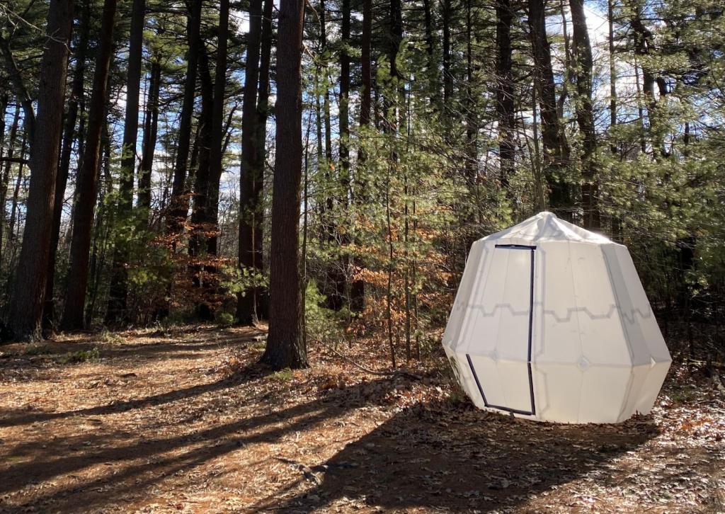 An inflatable shelter made from plastic sheets