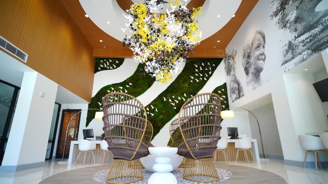 Yellow Goat Design build a custom Oh Oh light fixture for the lobby space of AMLI Midtown Miami. 