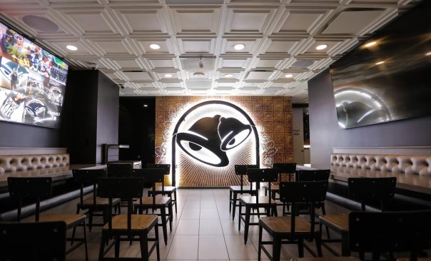 Taco Bell’s flagship Cantina on the Las Vegas Strip features a wedding chapel with wedding bells on the walls and an elegant coffered ceiling by Ceilume. 