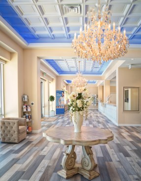Cloud 9 Medi-Spa supports its branding as a luxury clinic with crystal chandeliers and an elegant ceiling made of Ceilume thermoformed panels.