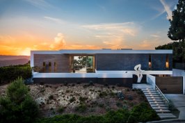 Exterior design and front steps of luxury modern home in Beverly Hills.
