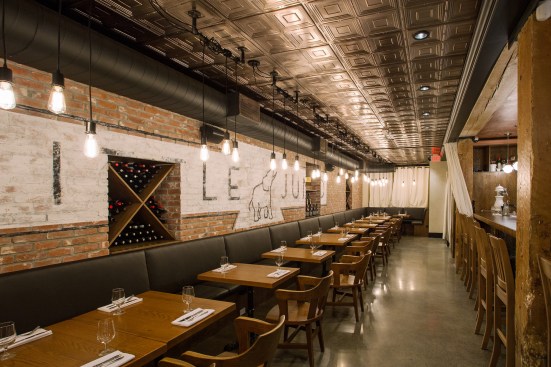 To create their modern 1920s New York-style speakeasy, Shawn Soole and Sara Baxter employed design tricks ranging from salvaging metal panels from a burned building to new thermoformed ceiling panel mimicking a classic look with modern convenience.  