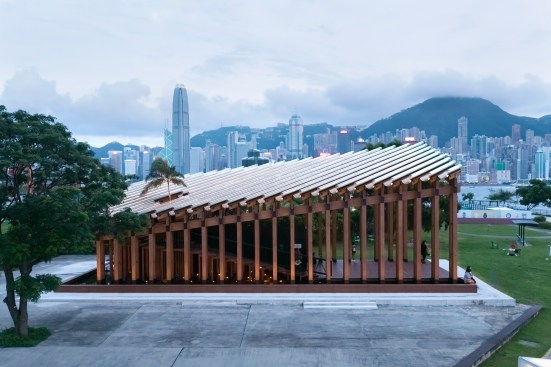 Growing Up, a pavilion in the West Kowloon Arts and Culture District in Hong Kong, uses timber columns to help frame views of the adjacent harbor. 